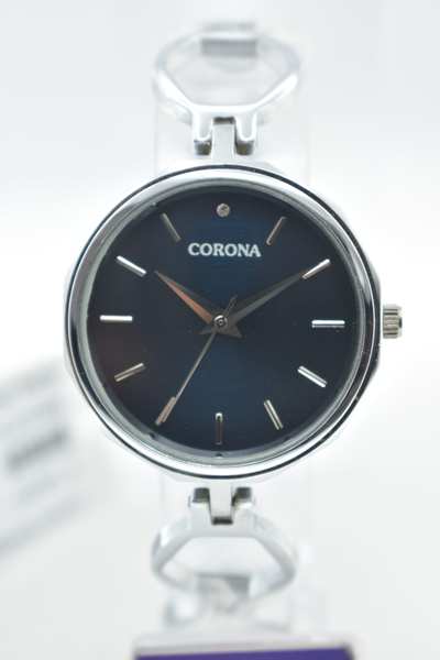 Presenting our distinguished Silver Plated Wrist Watch, a harmonious blend of sleek design and unwavering precision. Featuring a striking royal blue dial that commands attention, this timepiece is encased in a silver-plated exterior that exudes modernity and sophistication. Engineered with Japanese movement, it guarantees impeccable accuracy and dependable performance. The metal bracelet, seamlessly integrated, ensures both comfort and style. Elevate your wrist with this exceptional watch, a testament to the perfect fusion of elegance and functionality, designed to accompany you through every moment with unmatched class.