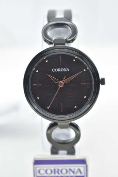 Presenting our Black Plated Women's Wrist Watch, a fusion of modern elegance and versatile style. The sleek black-plated case exudes contemporary sophistication, making a statement that's both bold and refined. Elevate your look with this exceptional timepiece, where urban chic meets classic design, resulting in a watch that's perfect for adding a touch of sophistication to any outfit.