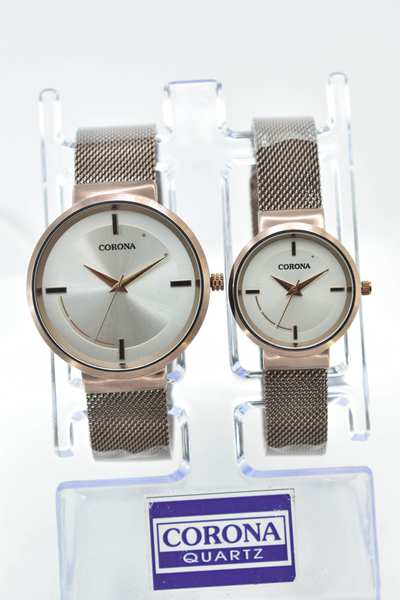 Introducing our Brown Plated Couple's Wrist Watches, a perfect combination of timeless love and shared style. These matching timepieces feature rich brown-plated cases that exude warmth and elegance, creating a harmonious balance between classic design and modern aesthetics. Elevate your connection with these exceptional watches, where enduring sophistication meets contemporary charm, resulting in a set that's perfect for celebrating your love and style together.