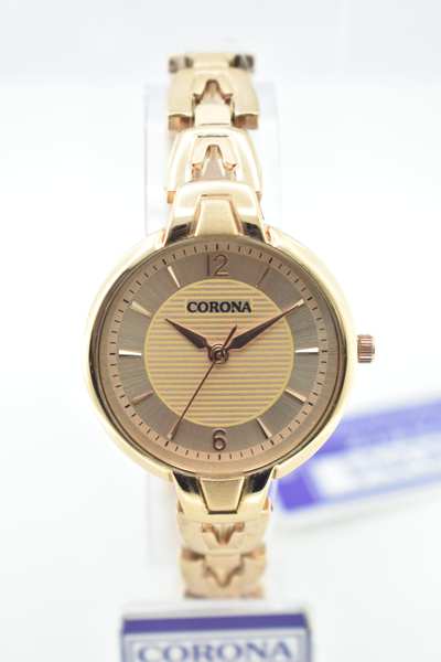 This beautiful women's wristwatch is perfect for any occasion. The wristwatch has a rose gold plated body with a stainless steel case and a gold tone bezel. The watch features a gold tone dial with two gold tone hands and Arabic numerals. The strap is a rose gold plated mesh with a clasp closure.