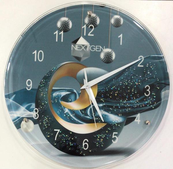 EXCLUSIVE RANGE OF DUAL GLASS WALL CLOCKS WITH RESIN WORK INSIDE.