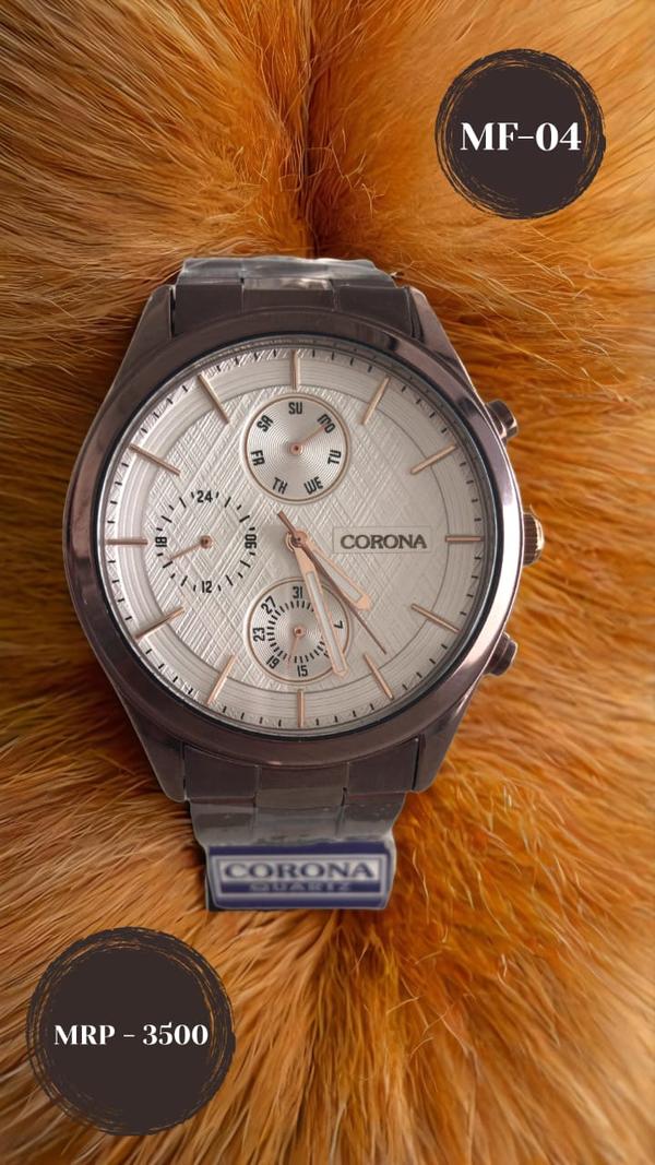 Warm and distinguished, this multifunction wrist watch features a rich brown case complemented by a crisp white dial. Designed for clarity and classic appeal, it offers time, day, date, and 24-hour displays—making it a stylish and reliable companion for both casual and formal settings.