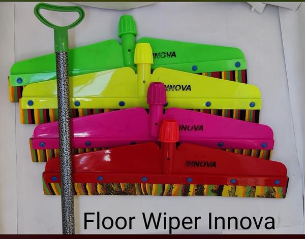 A floor wiper is a practical cleaning tool designed to efficiently remove water, dust, and dirt from various floor surfaces. Typically featuring a long handle and a flat rubber or foam blade, it allows users to push or pull moisture and debris with minimal effort. Floor wipers are commonly used in homes, offices, hospitals, and industrial settings to maintain hygiene and safety by preventing slippery surfaces. Lightweight and easy to maneuver, they are ideal for both wet and dry cleaning tasks. Modern designs may include adjustable handles or replaceable blades, enhancing durability and versatility for everyday cleaning needs.