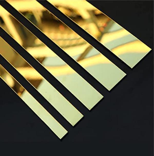 Golden strips—whether in glass or acrylic—are popular choices for adding a touch of luxury and elegance to interiors. They are commonly used in wall decor, furniture accents, and ceiling designs. Here's a guide to help you choose the right option:🪞 Glass Golden StripsFeatures:Offers a premium, reflective finish.Durable and resistant to scratches.Ideal for creating a sophisticated ambiance.Amazon IndiaExample:Mirror Gold Strip Wall Decor: Crafted from glass with a gold mirror finish, these strips are perfect for enhancing wall panels or furniture.🟨 Acrylic Golden StripsFeatures:Lightweight and easy to handle.Available in various finishes, including matte and glossy.Suitable for DIY projects and budget-friendly renovations.Examples:Mirror Gold Strip Wall Decor: These strips are made from acrylic with a mirror gold finish, offering a modern look for any space.Acrylic Golden Strips: Ideal for creating geometric patterns on walls or ceilings.Etsy🛠️ Installation TipsSurface Preparation: Ensure the surface is clean and dry before application.Measurement: Accurately measure the area to determine the number of strips needed.Adhesive: Use strong, clear adhesive suitable for the material of the strip.Alignment: Use a level to ensure strips are applied straight for a professional finish.🛒 Where to Buy in NagpurWhile specific local suppliers in Nagpur are not listed, you can explore online platforms that deliver to your location:Amazon India: Offers a variety of golden strips in both glass and acrylic materials.Etsy: Features unique and handcrafted golden strips suitable for various decor styles.