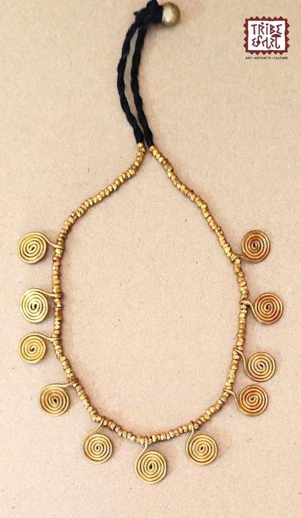 Dhokra Necklace setDhokra is an art almost 4000 years old, it adds an ethnic value to your space.It is also a long lasting & low maintenance item. The origin of dhokra art is from the tribal belts of West Bengal, Chhattisgarh and Odisha. Thus, the eccentric patterns, motifs and designs always stand out. When one adorns the dhokra tribal jewelry, they come across colorful beads, soft threads and metallic pendants that highlight the beauty of the attire. The larger pendants with simple threads are a hallmark of dhokra jewelry. The ornaments are inspired by elements of nature like leaves, the sun, the moon, spirals, etc. The beauty of these jewellery pieces lies in their versatility to be paired with either Indian clothing as well as western clothing to add that bohemian stroke.Tribe Chatari in Pune offers an authentic collection of Dhokra tribal jewellery, showcasing the rich heritage of Indian tribal artistry. Dhokra, a traditional form of metal casting, is known for its intricate designs and is a significant part of India's tribal art legacy.🛍️ Explore Dhokra Jewellery at Tribe ChatariLocated in the heart of Pune, Tribe Chatari is a hub for tribal artifacts and handicrafts from across India. The store features a diverse range of products, including Dhokra jewellery & bamboo jewellery which is handcrafted by skilled artisans. Visitors have praised the store for its extensive collection and the owners' deep knowledge of tribal arts.