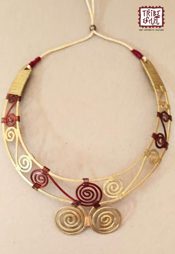 Dhokra Necklace Dhokra is an art almost 4000 years old, it adds an ethnic value to your space.It is also a long lasting & low maintenance item. The origin of dhokra art is from the tribal belts of West Bengal, Chhattisgarh and Odisha. Thus, the eccentric patterns, motifs and designs always stand out. When one adorns the dhokra tribal jewelry, they come across colorful beads, soft threads and metallic pendants that highlight the beauty of the attire. The larger pendants with simple threads are a hallmark of dhokra jewelry. The ornaments are inspired by elements of nature like leaves, the sun, the moon, spirals, etc. The beauty of these jewellery pieces lies in their versatility to be paired with either Indian clothing as well as western clothing to add that bohemian stroke.Tribe Chatari in Pune offers an authentic collection of Dhokra tribal jewellery, showcasing the rich heritage of Indian tribal artistry. Dhokra, a traditional form of metal casting, is known for its intricate designs and is a significant part of India's tribal art legacy.🛍️ Explore Dhokra Jewellery at Tribe ChatariLocated in the heart of Pune, Tribe Chatari is a hub for tribal artifacts and handicrafts from across India. The store features a diverse range of products, including Dhokra jewellery & bamboo jewellery which is handcrafted by skilled artisans. Visitors have praised the store for its extensive collection and the owners' deep knowledge of tribal arts.