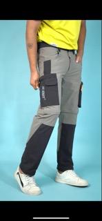 Water repellent & breathable fabric. 5 pocket design.Unisex PantsZip closure pockets for safety. Reflective radium prints to ensure better night visibility.Can be easily converted into shorts.12 months warranty on manufacturing defects.Elastic lock given at the bottom to narrow it down.Quick dry FabricColours: Forest Olive, Deep Blue