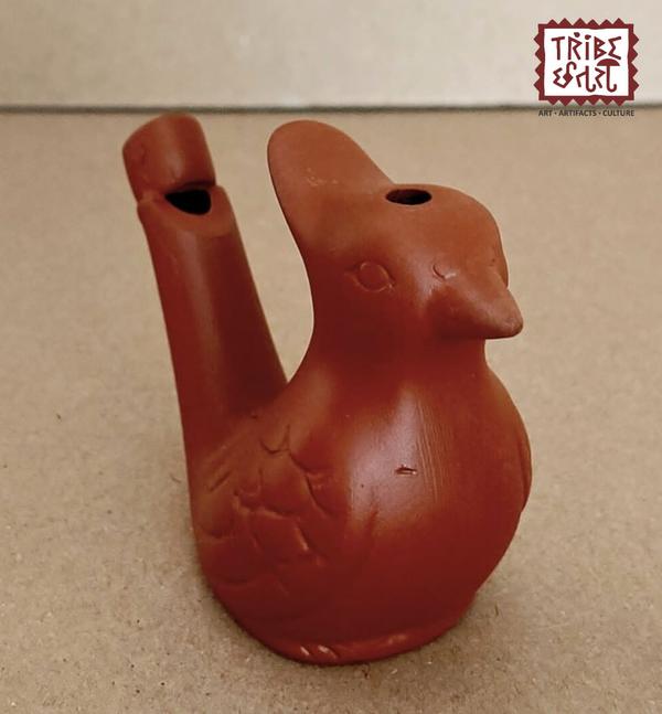 terracotta bird whistle is a traditional handmade clay toy shaped like a bird that produces a whistling sound when blown. It's often:Made from baked red clay (terracotta).one of the charming features of a terracotta bird whistle — when you fill it with a bit of water and blow into it, it creates a delightful warbling or trilling sound that mimics a bird’s song. Tribe Chatari is a renowned handicraft store in Pune dedicated to preserving and promoting India's tribal art and culture. Situated near Parvati Hill, it offers a diverse collection of authentic tribal artifacts sourced from various regions across the country.Minimum purchase quantity is 2