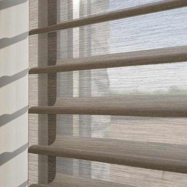 Triple Shade Blinds – Elegant Layers of Light and PrivacyTriple Shade Blinds offer a sophisticated blend of sheer fabric and light-blocking vanes, giving you total control over light and privacy. With soft fabric layers and smooth operation, these blinds add a luxurious look and gentle ambiance to any space. Ideal for living rooms, bedrooms, and upscale interiors.Combines sheer and opaque layers for layered light controlOffers both filtered daylight and full privacySmooth operation with a sleek finishPerfect for premium residential and corporate spaces