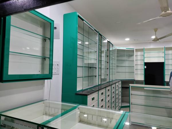 At Inside Interiors And Construction, we specialize in crafting bespoke pharmacy furniture solutions that combine functionality, style, and durability. Our expert team designs and manufactures custom shelving units, display cases, and storage solutions that cater to the unique needs of pharmacies. With a focus on quality, innovation, and customer satisfaction, we strive to create interior spaces that reflect your brand's identity and enhance the overall customer experience. From concept to completion, we work closely with our clients to bring their vision to life. Trust us to deliver exceptional pharmacy furniture solutions that elevate your business and inspire your customers