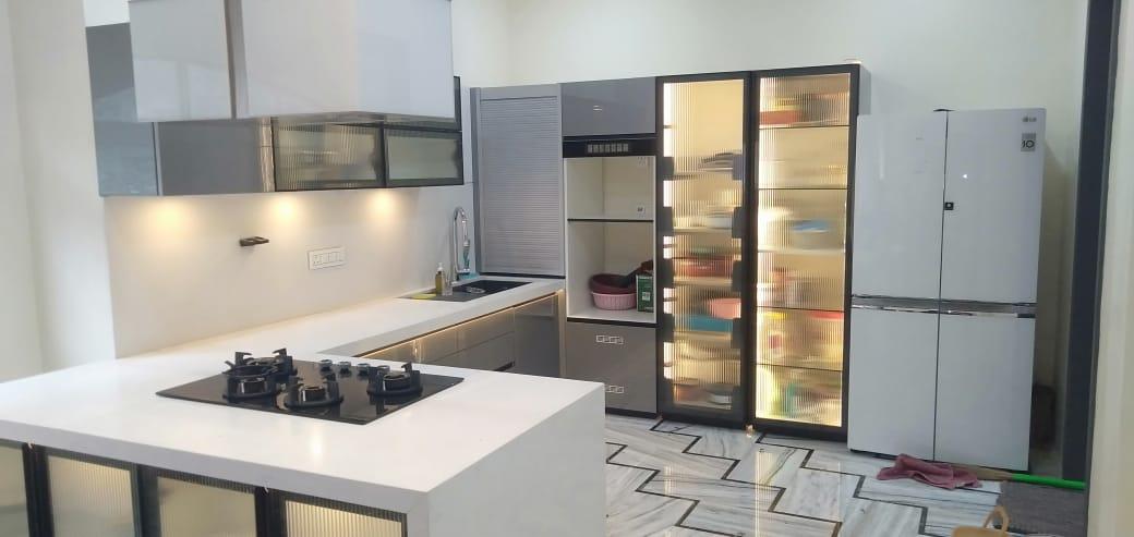 Transform your cooking space into a haven of style and functionality with Inside Interiors And Construction's bespoke modular kitchen solutions. Our expertly designed kitchens combine sleek aesthetics, innovative storage, and premium quality materials to create the perfect blend of form and function. From compact layouts to expansive designs, our modular kitchens are tailored to suit your unique needs and lifestyle. With a focus on durability, sustainability, and culinary convenience, we craft kitchens that inspire creativity, foster connection, and make every meal a delight