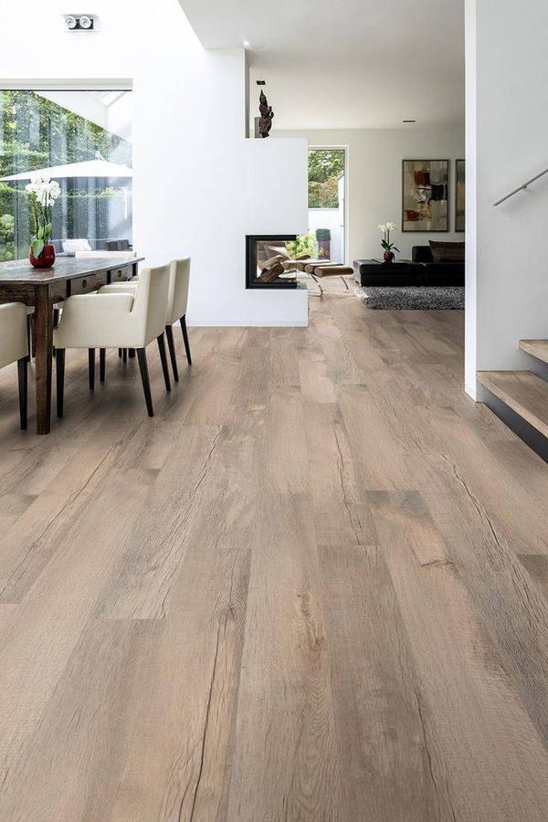 SPC flooring, or Stone Plastic Composite flooring, is a type of rigid core luxury vinyl flooring that combines the durability of stone with the aesthetics of wood or stone. It's known for its waterproof, scratch-resistant, and easy-to-install properties, making it suitable for both residential and commercial spaces.