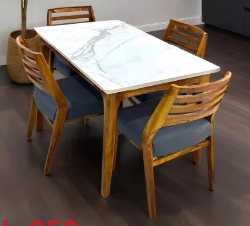 Wooden Dining Table ManufacturerRoyal Furniture is a trusted Wooden Dining Table Manufacturer known for its elegant craftsmanship and superior quality. Our dining tables are made from premium hardwoods, ensuring durability and a timeless finish that enhances every dining space. Designed to blend with both modern and traditional interiors, our tables come in various sizes, finishes, and styles to meet every customer's unique preference.As a reliable Wooden Dining Table Manufacturer, we focus on precision joinery, smooth finishes, and long-lasting polish, ensuring that each table becomes a centerpiece in your home. Our commitment to excellence has earned us a strong reputation in Ahmedabad and beyond.We proudly manufacture and supply wooden dining tables across all major areas of Ahmedabad, including Prahladnagar, SG Highway, Maninagar, Relief Road, Gota, Jodhpur Char Rasta, C.G. Road, Ravivari Market, Ghatlodia, and Changodar. Choose Royal Furniture – your trusted Wooden Dining Table Manufacturer for quality and style.