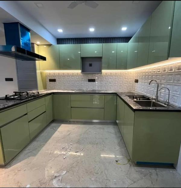 At Brajeshwari Interiors, we specialize in designing and installing modular kitchens that are both stylish and functional. Serving the GURUGRAM area, we bring over a decade of expertise to transform your kitchen into a space that perfectly balances aesthetics and practicality. Our Modular Kitchen Services Include: Initial Consultation and Design Planning: Detailed consultation to understand your cooking habits, lifestyle, and design preferences. Development of a personalized kitchen layout that maximizes space and enhances functionality. Customized Design Concepts: Tailored design concepts that blend aesthetics with practicality. Selection of styles ranging from contemporary to classic, ensuring your kitchen reflects your personal taste. 3D Visualization and Rendering: Detailed 3D visualizations to give you a clear picture of the final design. Opportunity to make adjustments and refinements before execution to ensure complete satisfaction. Material and Finish Selection: Guidance in choosing high-quality materials, finishes, and hardware. Access to a wide range of options including countertops, cabinets, and backsplashes to create a cohesive look. Storage Solutions: Innovative storage solutions to maximize space and improve organization. Custom cabinetry, pull-out shelves, and built-in organizers to keep your kitchen clutter-free and efficient. Installation and Execution: Skilled installation of modular kitchen units, ensuring precision and quality. Coordination with suppliers and craftsmen to maintain consistency and meet project timelines. Appliance Integration: Seamless integration of kitchen appliances into the design. Ensuring that all appliances are easily accessible and complement the overall aesthetic. Lighting Design: Strategic lighting solutions to enhance the functionality and ambiance of your kitchen. Selection of task, ambient, and accent lighting to create a well-lit and inviting space. Final Touches and Quality Check: Attention to detail in the final stages, ensuring every element meets our high standards. Comprehensive quality checks to ensure the kitchen is ready for use. Why Choose Brajeshwari Interiors for Your Modular Kitchen in GURUGRAM? Expertise and Experience: With over a decade of experience in the industry, our team brings a wealth of knowledge and creativity to each project. Personalized Service: We tailor our services to meet your specific needs and preferences, ensuring a personalized and unique outcome. Quality and Innovation: Committed to using top-quality materials and the latest design trends to deliver exceptional results. Efficient Process: From design to installation, we provide a complete range of services, ensuring a seamless and stress-free experience. At Brajeshwari Interiors, we believe that a well-designed kitchen can transform your cooking experience and enhance your home's overall appeal. Let us create a modular kitchen that is both beautiful and functional, tailored to your lifestyle and needs. Contact us today to start designing your dream kitchen in GURUGRAM.We are the Best  Interior Designer In GURUGRAM