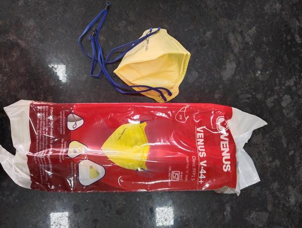 Venus V44+ Mask is a fold-flat, C-style respirator designed for protection against non-oil-based airborne particles.  It features a superior micro-fine filter media that effectively filters particles up to 0.3 microns, ensuring high filtration efficiency.  The mask includes an embedded nose clip for a secure fit and to minimize fogging of eyewear.  Its latex-free knitted textile elastic head straps are skin-friendly and maintain elasticity even at high temperatures.  Unique fit adjusters on the headband allow for a customized fit to the user's face profile.  Each mask is individually packed to prevent contamination and facilitate easy storage.  Suitable for use in healthcare, laboratories, and pharmaceutical environments, the Venus V44+ Mask offers reliable respiratory protection with enhanced comfort. 