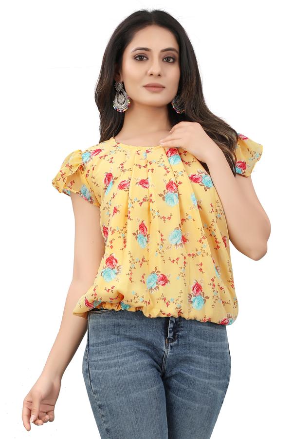 Add a pop of sunshine to your style with our latest yellow top, designed to bring fresh energy and effortless charm to your everyday look. Made from soft, breathable fabric, this top offers all-day comfort while keeping you on-trend.Whether you're heading to brunch, a casual day out, or simply want to uplift your outfit, this versatile piece pairs perfectly with jeans, skirts, or shorts. Featuring a flattering fit, elegant neckline, and subtle detailing, it’s a must-have addition to your wardrobe this season.