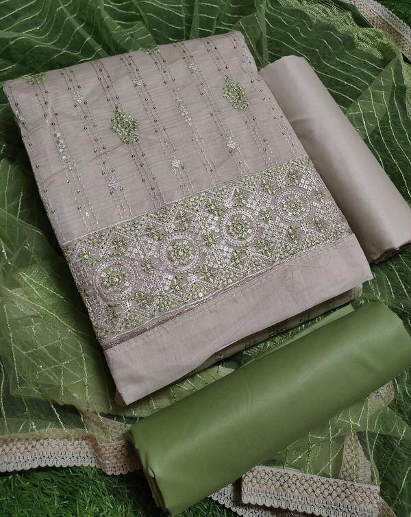 Elevate your ethnic wardrobe with this beautifully crafted White and Green Color Dress Material, adorned with intricate embroidery work that adds a touch of grace and sophistication. This unstitched set allows you to tailor it to your style and fit, perfect for festive occasions, casual gatherings, or traditional events.Step into elegance with this stunning White and Green Dress Material, crafted to reflect timeless beauty and traditional charm. Perfect for festive occasions or casual ethnic wear, this unstitched ensemble features intricate embroidery that adds a refined touch to your style.🔹 Top Fabric:Color: WhiteMaterial: Soft Cotton / Chanderi (as per variant)Work: Beautiful green thread embroidery on front, sleeves & hem🔹 Bottom Fabric:Color: Contrasting GreenMaterial: Comfortable Cotton / SantoonStyle: Plain or lightly embroidered for balanced elegance🔹 Dupatta:Color: Green with white detailingFabric: Chiffon / Nazneen / NetWork: Embroidered borders or lace finish🔹 Key Features:Sophisticated color combination of white and greenElegant embroidery work ideal for festive & semi-formal wearSoft and breathable fabricsUnstitched – tailor to your perfect fit🔹 Care Instructions:Dry clean preferred for long-lasting embroideryGentle hand wash with mild detergent