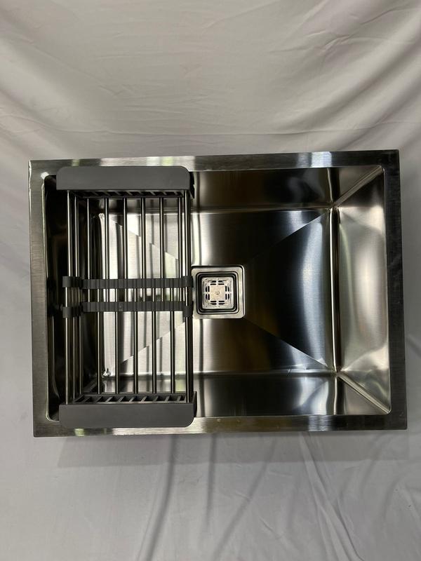 sink, also known as a washbasin or basin, is a plumbing fixture, typically a bowl or basin with taps (faucets) and a drain, used for washing hands, dishes, and other items. It's commonly found in kitchens and bathrooms.