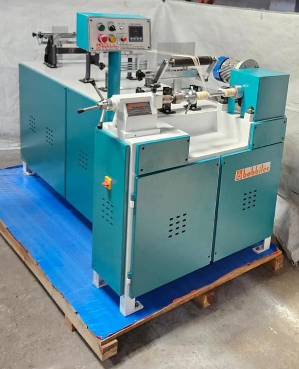 Twin Head Fully Automatic Warping MachineManufactured by Bobiler Tex Machinery IndiaBobiler Tex Machinery India presents the Twin Head Fully Automatic Warping Machine, a cutting-edge solution designed to maximize productivity and precision in modern textile manufacturing. Built for high-speed, continuous operation, this machine is engineered for manufacturers demanding superior efficiency, consistent output, and minimal human intervention.With twin head functionality and fully automated controls, it offers double the performance in a streamlined, high-tech package—perfect for large-scale warp beam preparation across various yarn types.Key Features:Twin Head Design: Simultaneous dual beam preparation significantly increases production efficiency.Fully Automatic Operation: Reduces manual involvement, improves accuracy, and enhances operator safety.Advanced Tension Control: Intelligent system ensures uniform yarn tension across both heads for flawless warp formation.Touchscreen Interface: Easy-to-use digital control panel for real-time monitoring and quick adjustments.Heavy-Duty Build: Rugged construction suited for continuous industrial use with minimal maintenance.High Speed Performance: Designed to support faster warping without compromising on yarn quality or alignment.Technical Specifications:Machine Type: Twin Head Fully AutomaticYarn Compatibility: Cotton, polyester, viscose, nylon, and blendsWarp Beam Size: Customizable based on client requirementsDrive System: Servo/AC motor-driven with intelligent automationControl System: PLC-based with HMI touchscreen displayOutput Efficiency: Ideal for high-volume weaving units and textile millsWhy Choose Bobiler Tex Machinery India?With years of excellence in textile machinery innovation, Bobiler Tex Machinery India offers reliable and high-performance equipment tailored to modern weaving needs. Our Twin Head Fully Automatic Warping Machine is engineered to reduce labor, increase output, and deliver superior beam quality—making it a smart investment for future-ready textile production.