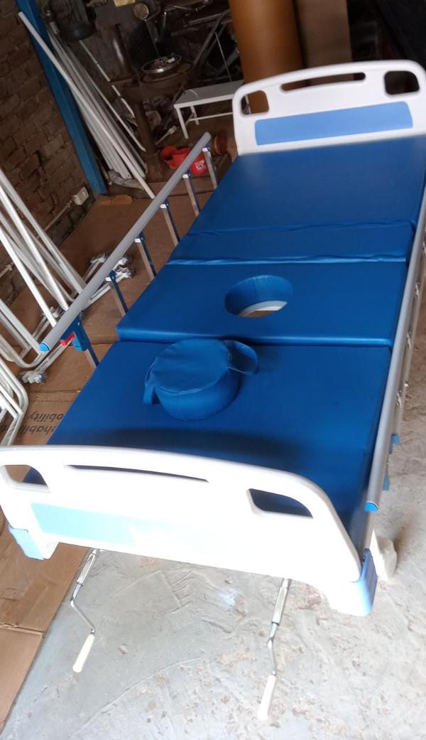 Construction & Material:Frame made of rectangular/square CRCA (Cold Rolled Close Annealed) steel tubesPowder coated or epoxy-coated finish for corrosion resistanceProvision of commode section with removable SS basin or plastic panBed Top:Two-section perforated CRCA sheet top for ventilationBackrest and knee rest operated by smooth crank mechanisms (optional motorized)Head & Foot Panels:ABS moulded panels (detachable type) for easy cleaning and maintenanceElegant design with integrated handles for mobilitySide Railing:Collapsible side railings (aluminum or MS with powder coating) for patient safetyEasy up-down mechanism with lockingWheels:4” (100 mm) diameter noiseless castor wheelsTwo wheels with brake for safety and lockingCommode Features:Built-in commode with removable basinAccess from top and/or sliding type opening for ease of useMattress:2/3/4-inch thick foam mattressWater-resistant, antibacterial coverFoldable in sections matching bed articulationDimensions (Approx.):Overall Size: 2060 mm (L) x 900 mm (W) x 600 mm (H)Backrest elevation: 0–75°Knee rest elevation: 0–35°Hospital Furniture Manufacturer in India/Gurgaon/Delhi NCRBest Medical furniture supplier/Manufacture in Gurgaon/Delhi NCRHospital Medical Equipments supplier/Manufacture in Gurgaon/Delhi NCR