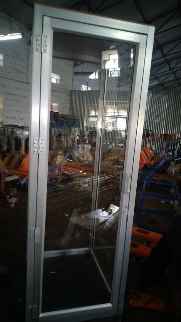 Premium Quality Goods Lift Manufacturers in Ernakulam Kerala.Shree Handling Equipments Goods Lift, also known as a freight elevator, is a specially designed lifting device used for transporting heavy or bulky goods vertically between floors in industrial, commercial, and warehouse settings. Unlike passenger elevators, goods lifts prioritize load capacity and durability over comfort and speed.Types of Goods LiftsHydraulic Goods LiftUses hydraulic fluid pressure to lift the platform.Suitable for medium-rise buildings.Energy-efficient as it consumes power only during lifting.Electric (Traction) Goods LiftOperated using electric motors and steel cables.Ideal for high-rise buildings and continuous operation.Scissor Lift TableA platform supported by scissor-like metal supports.Ideal for ground-to-truck or dock-level loading.Key FeaturesHigh Load Capacity (typically from 500 kg to 5,000 kg or more)Robust Construction (heavy-duty steel frame and reinforced platforms)Multiple Safety Features like:Emergency stop buttonDoor interlocksOverload protectionSafety brakesCustomizable Cabin Size to suit different types of goodsEase of Operation via push-button or remote controlEnclosed or Open Type depending on usage and safety needsApplicationsFactories & Industries – To move raw materials or finished products.Warehouses & Distribution Centers – For storage and logistics support.Supermarkets & Retail Stores – Stock transfer between floors.Construction Sites – Transport of construction materials.Hotels & Commercial Kitchens – Used as dumbwaiters for food or linen.BenefitsIncreased Efficiency in material handlingReduces Manual Labor, improving worker safetyTime-Saving solution for vertical goods transportSpace-Efficient, especially for buildings with limited layout optionsCost-Effective in the long run due to enhanced productivityWould you like a tailored description for a specific brand, capacity, or application (like warehouse, hotel, or construction site)?We are happy to supply other cities like Changanassery, Mattanur, Punalur, Nilambur, Cherthala, Sultan, Bathery, Maradu, Kottakkal, Taliparamba, Shornur, Pandalam, Kattappana, Cherpulassery, Mukkam, Iritty, Valanchery, Varkala, Nileshwaram, Chavakkad, Kothamangalam, Pathanamthitta, Attingal in Kerala, South India. Other SearchesTop Goods Lift Manufacturers in ErnakulamIndustrial Goods Lift Manufacturers in ErnakulamSmall Goods Lift Manufacturers in ErnakulamGoods Lift Manufacturers in Ernakulam Contact NumberHydraulic Goods Lift Manufacturers in ErnakulamBest Goods Lift Manufacturers in ErnakulamElevator Manufacturers in Ernakulam