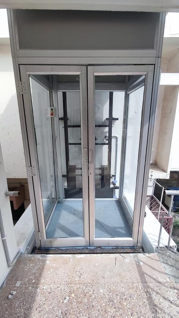 Best Quality Goods Lift Manufacturers in Kozhikode Kerala.Shree Handling Equipments Goods Lift, also known as a freight elevator, is a specially designed lifting device used for transporting heavy or bulky goods vertically between floors in industrial, commercial, and warehouse settings. Unlike passenger elevators, goods lifts prioritize load capacity and durability over comfort and speed.Types of Goods LiftsHydraulic Goods LiftUses hydraulic fluid pressure to lift the platform.Suitable for medium-rise buildings.Energy-efficient as it consumes power only during lifting.Electric (Traction) Goods LiftOperated using electric motors and steel cables.Ideal for high-rise buildings and continuous operation.Scissor Lift TableA platform supported by scissor-like metal supports.Ideal for ground-to-truck or dock-level loading.Key FeaturesHigh Load Capacity (typically from 500 kg to 5,000 kg or more)Robust Construction (heavy-duty steel frame and reinforced platforms)Multiple Safety Features like:Emergency stop buttonDoor interlocksOverload protectionSafety brakesCustomizable Cabin Size to suit different types of goodsEase of Operation via push-button or remote controlEnclosed or Open Type depending on usage and safety needsApplicationsFactories & Industries – To move raw materials or finished products.Warehouses & Distribution Centers – For storage and logistics support.Supermarkets & Retail Stores – Stock transfer between floors.Construction Sites – Transport of construction materials.Hotels & Commercial Kitchens – Used as dumbwaiters for food or linen.BenefitsIncreased Efficiency in material handlingReduces Manual Labor, improving worker safetyTime-Saving solution for vertical goods transportSpace-Efficient, especially for buildings with limited layout optionsCost-Effective in the long run due to enhanced productivityWould you like a tailored description for a specific brand, capacity, or application (like warehouse, hotel, or construction site)?We are happy to supply other cities like Paravur, Ramanattukara, Mannarkkad, Erattupetta, Sreekandapuram, Angamaly, Chittur Thathamangalam, Kalpetta, North Paravur, Haripad, Muvattupuzha, Kottarakara, Kuthuparamba, Adoor, Pattambi, Anthoor, Perumbavoor, Piravom, Ettumanoor, Mavelikkara, Eloor in Kerala, South India.Other SearchesTop Goods Lift Manufacturers in KozhikodeIndustrial Goods Lift Manufacturers in KozhikodeSmall Goods Lift Manufacturers in KozhikodeGoods Lift Manufacturers in Kozhikode Contact NumberHydraulic Goods Lift Manufacturers in KozhikodeBest Goods Lift Manufacturers in KozhikodeElevator Manufacturers in Kozhikode