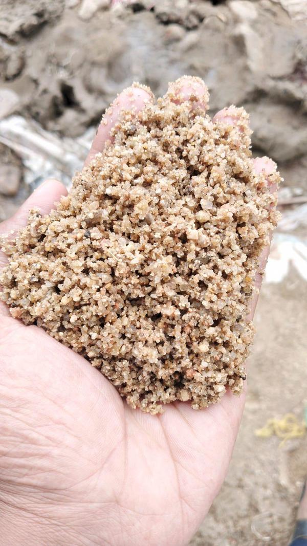 Bodeli sand is a type of natural river sand extracted from the Orsang River near Bodeli in the Chhota Udaipur district of Gujarat, India. It is coarse to medium-grained, typically brown or creamy in color, and valued for its strength and durability. Rich in silica and free from harmful salts and organic matter, Bodeli sand is widely used in the construction industry due to its excellent binding properties.Its primary uses include concrete production, brickwork, plastering, and manufacturing of cement products such as pipes and blocks. The sand is also used in infrastructure projects like roads, bridges, and foundations, where consistent quality is critical. Additionally, processed or washed Bodeli sand is preferred for applications requiring minimal silt content and improved workability.Due to increasing demand and its role in civil engineering, Bodeli sand is a vital resource in Gujarat’s building sector, though environmental regulations now govern its extraction to prevent overmining.