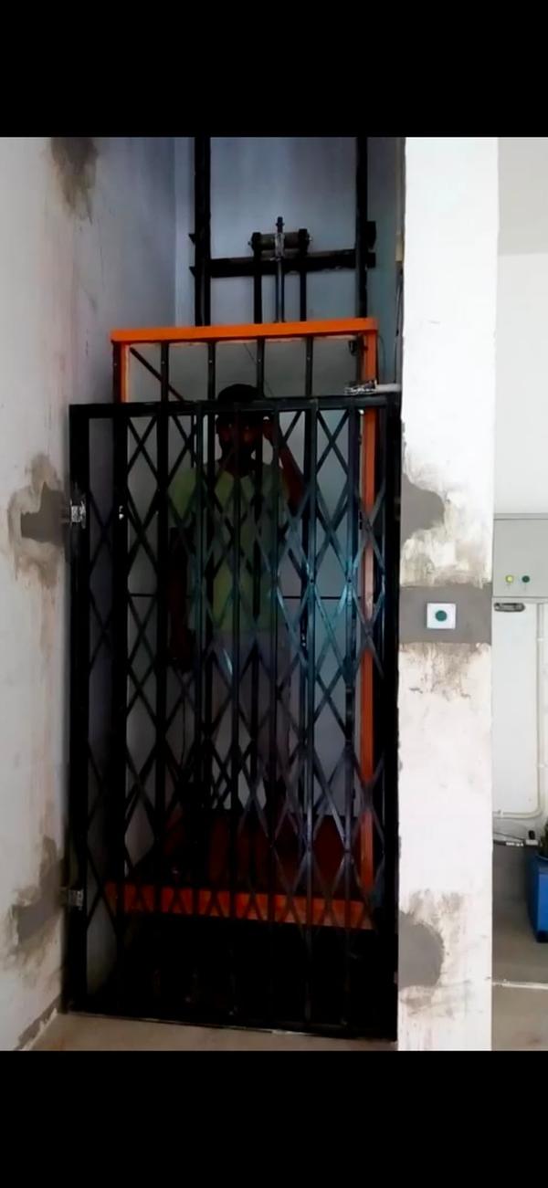 No1 Goods Lift Manufacturers in Kollam, Kerala, South India.Shree Handling Equipments Goods Lift, also known as a freight elevator, is a specially designed lifting device used for transporting heavy or bulky goods vertically between floors in industrial, commercial, and warehouse settings. Unlike passenger elevators, goods lifts prioritize load capacity and durability over comfort and speed.Types of Goods LiftsHydraulic Goods LiftUses hydraulic fluid pressure to lift the platform.Suitable for medium-rise buildings.Energy-efficient as it consumes power only during lifting.Electric (Traction) Goods LiftOperated using electric motors and steel cables.Ideal for high-rise buildings and continuous operation.Scissor Lift TableA platform supported by scissor-like metal supports.Ideal for ground-to-truck or dock-level loading.Key FeaturesHigh Load Capacity (typically from 500 kg to 5,000 kg or more)Robust Construction (heavy-duty steel frame and reinforced platforms)Multiple Safety Features like:Emergency stop buttonDoor interlocksOverload protectionSafety brakesCustomizable Cabin Size to suit different types of goodsEase of Operation via push-button or remote controlEnclosed or Open Type depending on usage and safety needsApplicationsFactories & Industries – To move raw materials or finished products.Warehouses & Distribution Centers – For storage and logistics support.Supermarkets & Retail Stores – Stock transfer between floors.Construction Sites – Transport of construction materials.Hotels & Commercial Kitchens – Used as dumbwaiters for food or linen.BenefitsIncreased Efficiency in material handlingReduces Manual Labor, improving worker safetyTime-Saving solution for vertical goods transportSpace-Efficient, especially for buildings with limited layout optionsCost-Effective in the long run due to enhanced productivityWould you like a tailored description for a specific brand, capacity, or application (like warehouse, hotel, or construction site)?We are happy to supply other cities like Thiruvananthapuram, Ernakulam, Chengannur, Vaikom, Aluva, Pala, Koothattukulam in Kerala, South India.Other SearchesTop Goods Lift Manufacturers in KollamIndustrial Goods Lift Manufacturers in KollamSmall Goods Lift Manufacturers in KollamGoods Lift Manufacturers in Kollam Contact NumberHydraulic Goods Lift Manufacturers in KollamBest Goods Lift Manufacturers in KollamElevator Manufacturers in Kollam