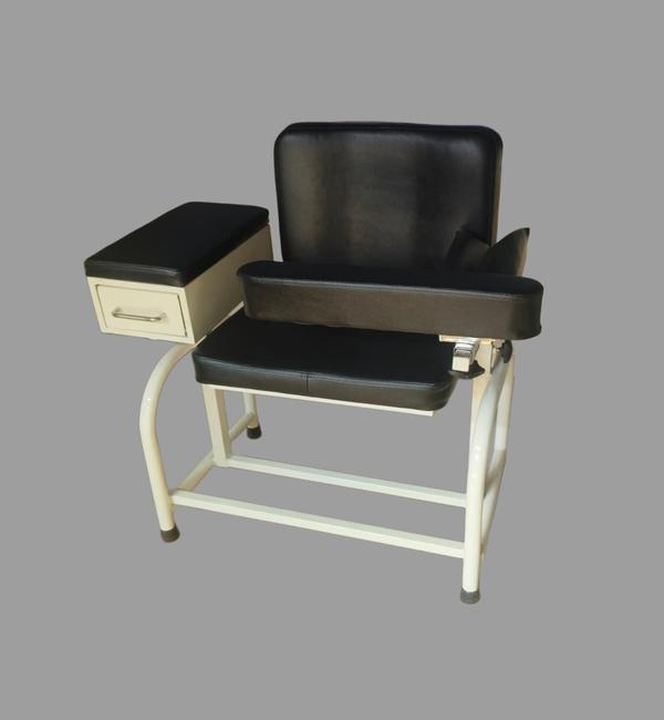 Gentek Mild Steel Hospital Blood Collection ChairProduct Description:A comfortable and durable chair designed for Gentek blood collection in hospitals, diagnostic centers, and blood banks, built with a strong mild steel frame and ergonomic features for both patient comfort and technician convenience.✅ Technical Specifications:Structure:Made of Mild Steel (M.S.) square/round tubular framePowder coated finish for rust resistance and long-lasting durabilitySeat & Backrest:Cushioned seat and backrest with high-density PU foamUpholstered with antimicrobial, easy-to-clean rexineErgonomic design to ensure patient comfort during proceduresArmrests:Dual adjustable armrestsPadded and rotating typeHeight and angle adjustable to suit left- or right-arm collectionStorage Box:Integrated metal storage box under the seat or attached to sideIdeal for keeping syringes, tubes, cotton, and other suppliesOptional lockable featureLeg Support:Fixed or optional adjustable leg rest for enhanced comfortRubber Shoes:Non-slip rubber stoppers on legs to provide grip and floor protectionDimensions (Approx.):Seat Height: 18–20 inchesOverall Width: 24–28 inchesOverall Depth: 30–36 inchesBackrest Height: 36–42 inches🛠️ Optional Features (on request):Foldable designIV rod attachmentReclining backrest (manual)Castor wheels (2 or 4, with brake)Hospital Furniture Manufacturer in India/Gurgaon/Delhi NCRBest Medical furniture supplier/Manufacture in Gurgaon/Delhi NCRHospital Medical Equipments supplier/Manufacture in Gurgaon/Delhi NCR