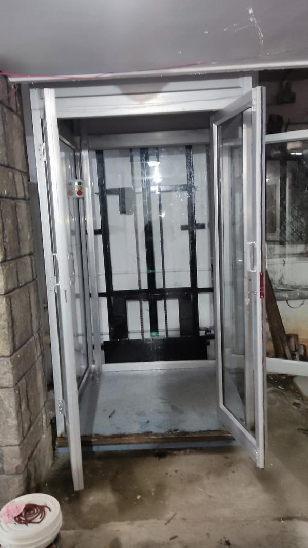 Premium Quality Goods Lift Manufacturers in Palakkad, Kerala, South India.Shree Handling Equipments Goods Lift, also known as a freight elevator, is a specially designed lifting device used for transporting heavy or bulky goods vertically between floors in industrial, commercial, and warehouse settings. Unlike passenger elevators, goods lifts prioritize load capacity and durability over comfort and speed.Types of Goods LiftsHydraulic Goods LiftUses hydraulic fluid pressure to lift the platform.Suitable for medium-rise buildings.Energy-efficient as it consumes power only during lifting.Electric (Traction) Goods LiftOperated using electric motors and steel cables.Ideal for high-rise buildings and continuous operation.Scissor Lift TableA platform supported by scissor-like metal supports.Ideal for ground-to-truck or dock-level loading.Key FeaturesHigh Load Capacity (typically from 500 kg to 5,000 kg or more)Robust Construction (heavy-duty steel frame and reinforced platforms)Multiple Safety Features like:Emergency stop buttonDoor interlocksOverload protectionSafety brakesCustomizable Cabin Size to suit different types of goodsEase of Operation via push-button or remote controlEnclosed or Open Type depending on usage and safety needsApplicationsFactories & Industries – To move raw materials or finished products.Warehouses & Distribution Centers – For storage and logistics support.Supermarkets & Retail Stores – Stock transfer between floors.Construction Sites – Transport of construction materials.Hotels & Commercial Kitchens – Used as dumbwaiters for food or linen.BenefitsIncreased Efficiency in material handlingReduces Manual Labor, improving worker safetyTime-Saving solution for vertical goods transportSpace-Efficient, especially for buildings with limited layout optionsCost-Effective in the long run due to enhanced productivityWould you like a tailored description for a specific brand, capacity, or application (like warehouse, hotel, or construction site)?We are happy to supply other cities like Thiruvananthapuram, Ernakulam, Chengannur, Vaikom, Aluva, Pala, Koothattukulam in Kerala, South India.Other SearchesTop Goods Lift Manufacturers in PalakkadIndustrial Goods Lift Manufacturers in PalakkadSmall Goods Lift Manufacturers in PalakkadGoods Lift Manufacturers in Palakkad Contact NumberHydraulic Goods Lift Manufacturers in PalakkadBest Goods Lift Manufacturers in PalakkadElevator Manufacturers in Palakkad