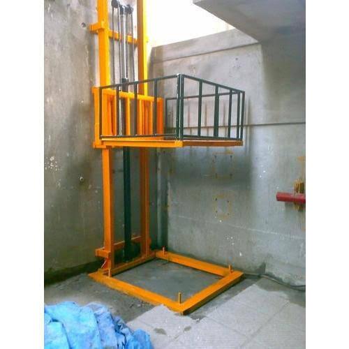 Top Rated Goods Lift Manufacturers in Thalassery, Kerala, South India.Shree Handling Equipments Goods Lift, also known as a freight elevator, is a specially designed lifting device used for transporting heavy or bulky goods vertically between floors in industrial, commercial, and warehouse settings. Unlike passenger elevators, goods lifts prioritize load capacity and durability over comfort and speed.Types of Goods LiftsHydraulic Goods LiftUses hydraulic fluid pressure to lift the platform.Suitable for medium-rise buildings.Energy-efficient as it consumes power only during lifting.Electric (Traction) Goods LiftOperated using electric motors and steel cables.Ideal for high-rise buildings and continuous operation.Scissor Lift TableA platform supported by scissor-like metal supports.Ideal for ground-to-truck or dock-level loading.Key FeaturesHigh Load Capacity (typically from 500 kg to 5,000 kg or more)Robust Construction (heavy-duty steel frame and reinforced platforms)Multiple Safety Features like:Emergency stop buttonDoor interlocksOverload protectionSafety brakesCustomizable Cabin Size to suit different types of goodsEase of Operation via push-button or remote controlEnclosed or Open Type depending on usage and safety needsApplicationsFactories & Industries – To move raw materials or finished products.Warehouses & Distribution Centers – For storage and logistics support.Supermarkets & Retail Stores – Stock transfer between floors.Construction Sites – Transport of construction materials.Hotels & Commercial Kitchens – Used as dumbwaiters for food or linen.BenefitsIncreased Efficiency in material handlingReduces Manual Labor, improving worker safetyTime-Saving solution for vertical goods transportSpace-Efficient, especially for buildings with limited layout optionsCost-Effective in the long run due to enhanced productivityWould you like a tailored description for a specific brand, capacity, or application (like warehouse, hotel, or construction site)?We are happy to supply other cities like Guruvayur, Thrikkakkara, Irinjalakuda, Wadakkancherry, Nedumangad, Kondotty, Tirurangadi, Tirur, Panoor, Kasaragod, Feroke, Kunnamkulam, Ottappalam, Thiruvalla, Thodupuzha, Perinthalmanna, Karunagappalli, Chalakudy, Payyoli, Koduvally, Mananthavady in Kerala, South India.Other SearchesTop Goods Lift Manufacturers in ManjeriIndustrial Goods Lift Manufacturers in ManjeriSmall Goods Lift Manufacturers in ManjeriGoods Lift Manufacturers in Manjeri Contact NumberHydraulic Goods Lift Manufacturers in ManjeriBest Goods Lift Manufacturers in ManjeriElevator Manufacturers in Manjeri