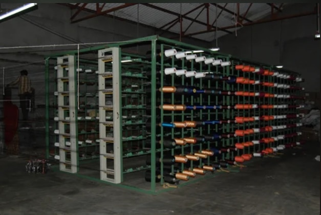 Warping Creel ManufacturerWARPING CREEL MANUFACTURERBOBBILER is a trusted name in the textile machinery industry, proudly recognized as a leading Warping Creel Manufacturer in India. Our warping creels are designed for optimal yarn management, offering high performance, easy operation, and seamless integration with modern warping systems. Whether you're operating a small weaving unit or a large-scale textile manufacturing plant, our creels deliver consistent results across various yarn types and counts.As a reliable Warping Creel Manufacturer, BOBBILER ensures that every product is engineered for durability, stability, and precision. Our creels feature modular designs that can be customized to suit your warping machine requirements — whether you need vertical or horizontal types, with fixed or rotating frames. The yarn tensioning system is adjustable, and each creel is fitted with high-quality yarn holders and anti-friction guides, allowing for smooth yarn delivery and reduced breakage during the warping process.We combine innovative design with robust construction to help our clients increase productivity and reduce downtime. From superior raw materials to stringent quality checks, every BOBBILER creel is built to last and perform under heavy-duty usage.Choose BOBBILER as your Warping Creel Manufacturer for solutions that enhance your warping accuracy and operational efficiency. With nationwide support and global standards, we’re committed to empowering your textile manufacturing journey.