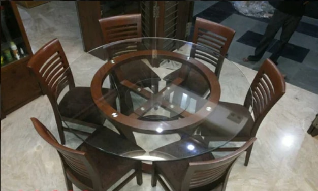 Round Glass Top Dining Table ManufacturerROYAL FURNITURE – Premier Round Glass Top Dining Table ManufacturerROYAL FURNITURE is a renowned Round Glass Top Dining Table Manufacturer, offering elegant and modern dining solutions that elevate the look of any space. Our round glass top tables are crafted with precision using high-quality tempered glass and sturdy base materials such as wood, stainless steel, or metal for long-lasting durability and refined aesthetics.As a trusted Round Glass Top Dining Table Manufacturer, we cater to customers across Gujarat, including Ahmedabad, Gandhinagar, Anand, Mahesana, Vadodara, Sabarkantha, Bhavnagar, Bharuch, Ankleshwar, Banaskantha, and Rajkot. Within Ahmedabad, our services extend to popular areas like Prahladnagar, SG Highway, Maninagar, Relief Road, Gota, Jodhpur Char Rasta, C.G. Road, Ravivari Market, Ghatlodia, and Changodar.Whether you're furnishing a home dining room, a luxury apartment, or a hospitality space, ROYAL FURNITURE delivers style and strength in every piece. Choose us as your Round Glass Top Dining Table Manufacturer for timeless design, excellent craftsmanship, and superior service.