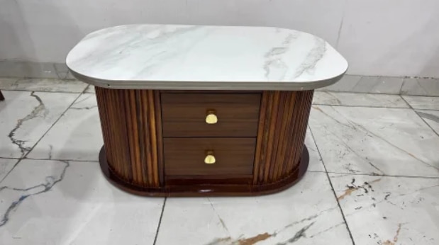 Marble Top Coffee Table ManufacturerROYAL FURNITURE – Trusted Marble Top Coffee Table ManufacturerROYAL FURNITURE is a premium Marble Top Coffee Table Manufacturer, offering elegant and durable center tables designed to enhance the luxury of any living space. Our coffee tables are crafted using high-grade marble tops paired with solid wood or metal bases, providing a perfect blend of style and strength.As a reputed Marble Top Coffee Table Manufacturer, we supply across Gujarat including Ahmedabad, Gandhinagar, Anand, Mahesana, Vadodara, Sabarkantha, Bhavnagar, Bharuch, Ankleshwar, Banaskantha, and Rajkot. In Ahmedabad, our delivery network includes key locations like Prahladnagar, SG Highway, Maninagar, Relief Road, Gota, Jodhpur Char Rasta, C.G. Road, Ravivari Market, Ghatlodia, and Changodar.Available in round, square, and rectangular designs, our marble top coffee tables suit modern and traditional interiors alike. Choose ROYAL FURNITURE – your dependable Marble Top Coffee Table Manufacturer – for timeless designs, premium materials, and unmatched quality.