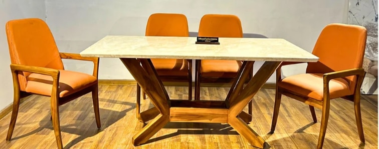 Wooden Dining Table Set Manufacturer
ROYAL FURNITURE is a trusted Wooden Dining Table Set Manufacturer, delivering timeless dining solutions crafted from high-quality hardwoods. Our wooden dining sets are designed to bring warmth, durability, and elegance to your home, restaurant, or hospitality space.
As a reputed Wooden Dining Table Set Manufacturer, we supply across Gujarat, including Ahmedabad, Gandhinagar, Anand, Mahesana, Vadodara, Sabarkantha, Bhavnagar, Bharuch, Ankleshwar, Banaskantha, and Rajkot. In Ahmedabad, we actively serve areas like Prahladnagar, SG Highway, Maninagar, Relief Road, Gota, Jodhpur Char Rasta, C.G. Road, Ravivari Market, Ghatlodia, and Changodar.
Available in 4-seater, 6-seater, and 8-seater options, our wooden dining table sets feature various finishes and styles—from classic to contemporary. Choose ROYAL FURNITURE – your reliable Wooden Dining Table Set Manufacturer – for unmatched craftsmanship, long-lasting materials, and elegant design.