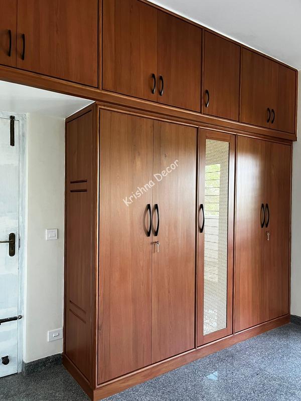 Coimbatore Bedroom Wardrobe Doors With Glass.Krishna decor make a best and Quality Interior jobwork products in Coimbatore.For Enquiry contact Krishna Decor+91 9042068977