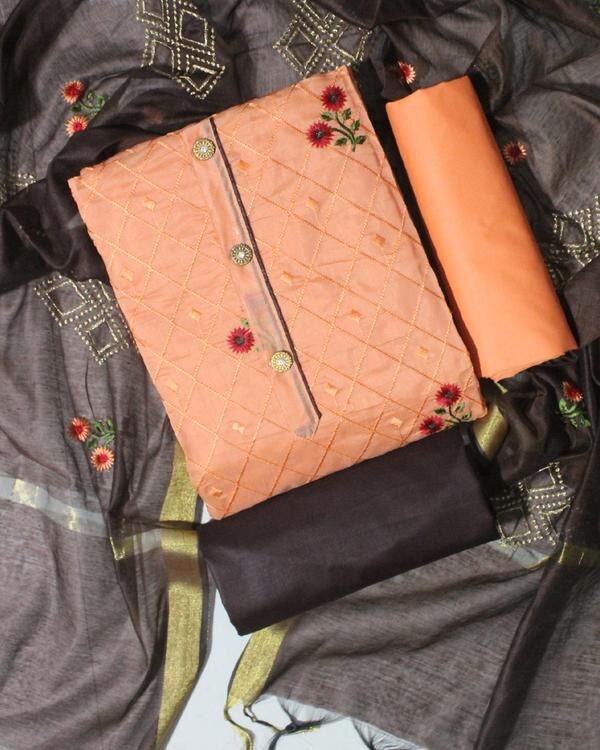 An orange and brown embroidered work dress material typically refers to an unstitched fabric set, often used to make traditional Indian outfits like salwar suits or churidars. Here's a breakdown of what such a dress material might include and what makes it appealing:🧵 Description:Colors:Top: Bright orange — symbolizes vibrance and energy.Bottom: Deep brown — adds warmth and balance.Dupatta (Scarf): Often a combination of orange & brown, possibly with printed or embroidered borders.Fabric Options:Top: Cotton, georgette, silk blend, or chanderi with embroidery.Bottom: Cotton or santoon (a soft synthetic fabric).Dupatta: Chiffon, nazneen, or net with matching embroidery or lacework.Embroidery Work:Thread Work: Traditional floral or geometric motifs.Zari or Mirror Work: For festive or semi-formal appeal.Neckline & Border Highlights: Often heavily embroidered for added elegance.🌟 Ideal For:Festive occasionsFamily gatheringsSemi-formal eventsDaytime functions due to the bright color palette🛍️ Style Tips:Pair with oxidized or gold-tone jewelry.Footwear: Mojaris or embellished sandals.Add a matching potli bag or clutch for ethnic flair.
