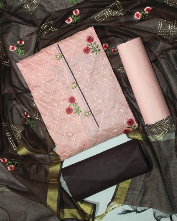 Product Description:Elevate your ethnic wardrobe with this elegant Peach and Brown Color Embroidered Work Dress Material. Crafted from premium-quality fabric, this unstitched suit set features a beautifully embroidered peach top, paired with a solid brown bottom and a coordinated dupatta to complete the look.The intricate thread embroidery on the top adds a touch of traditional charm, making it ideal for festive occasions, cultural events, and semi-formal gatherings. The soothing peach tone brings softness and elegance, while the rich brown offers a grounding contrast for a well-balanced, graceful ensemble.📦 Product Details:Top Fabric: Peach-colored (Cotton / Georgette / Chanderi with embroidery)Bottom Fabric: Brown (Cotton / Santoon / Silk blend)Dupatta: Printed or embroidered in peach & brown shadesWork: Embroidery / Thread Work / Zari WorkType: Unstitched Dress MaterialOccasion: Festive wear, party wear, casual traditional, or ethnic day🌟 Why You'll Love It:Soft, comfortable fabric with fine embroideryElegant color combination – perfect for all skin tonesCan be custom-stitched into salwar suits, straight kurtis, or churidarsGreat choice for gifting or personal wear