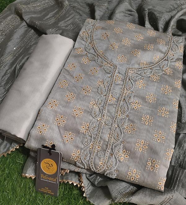 Elevate your ethnic wardrobe with this elegant Grey Embroidered Dress Material with Dupatta. Crafted with precision, the unstitched fabric features intricate thread embroidery that adds a touch of sophistication and charm. Perfect for festive occasions, casual gatherings, or special events, this set is a blend of tradition and contemporary style.Product Details:Color: Elegant GreyFabric (Top): Premium Cotton / Chanderi / Georgette (customizable based on actual fabric)Fabric (Bottom): Matching Solid Cotton / SantoonDupatta: Embroidered or Printed Chiffon / Net / NazneenWork: Delicate Embroidery with Fine DetailingType: Unstitched Dress MaterialStyle: Straight Cut / Anarkali / Semi-stitched (as applicable)Occasion: Festive, Casual, Office Wear, PartyHighlights:Graceful grey tone suitable for all skin tonesLightweight and breathable materialEasy to customize and tailor to your desired fitDupatta complements the outfit with matching embroidery or borderElevate your ethnic wardrobe with this elegant Grey Embroidered Dress Material with Dupatta. Crafted with precision, the unstitched fabric features intricate thread embroidery that adds a touch of sophistication and charm. Perfect for festive occasions, casual gatherings, or special events, this set is a blend of tradition and contemporary style.Product Details:Color: Elegant GreyFabric (Top): Premium Cotton / Chanderi / Georgette (customizable based on actual fabric)Fabric (Bottom): Matching Solid Cotton / SantoonDupatta: Embroidered or Printed Chiffon / Net / NazneenWork: Delicate Embroidery with Fine DetailingType: Unstitched Dress MaterialStyle: Straight Cut / Anarkali / Semi-stitched (as applicable)Occasion: Festive, Casual, Office Wear, PartyHighlights:Graceful grey tone suitable for all skin tonesLightweight and breathable materialEasy to customize and tailor to your desired fitDupatta complements the outfit with matching embroidery or border