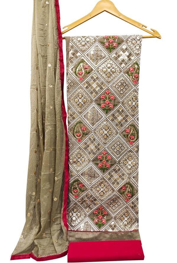 Step into understated elegance with this timeless Beige Embroidered Chanderi Dress Material with Dupatta, designed for women who value grace, tradition, and sophistication. Featuring delicate floral embroidery on luxurious Chanderi fabric, this unstitched suit set offers the perfect blend of heritage craftsmanship and modern style.Top Material: Premium Chanderi fabric in a serene beige tone, beautifully adorned with floral embroidery—crafted with fine threads to add a touch of texture and finesse to your ethnic ensemble.Bottom Material: Matching or contrasting cotton or Chanderi blend, offering breathable comfort and a polished look that pairs seamlessly with the embroidered top.Dupatta: Coordinated Chanderi dupatta with light floral embroidery or subtle printed detailing and a bordered finish, enhancing the richness of the outfit without overwhelming its simplicity.Key Features:Fabric: Chanderi (Top & Dupatta), Cotton/Chanderi Blend (Bottom)Work: Thread Embroidery – Floral MotifsColor: Classic Beige with Subtle Multi-thread EmbroideryType: Unstitched – Customizable for various ethnic stylesOccasion: Ideal for festive gatherings, daytime events, traditional functions, and elegant office wearCare Instructions: Dry clean recommended to preserve embroidery and fabric sheenFabric Measurements:Top: Approx. 2.5 metersBottom: Approx. 2.5 metersDupatta: Approx. 2.25 meters