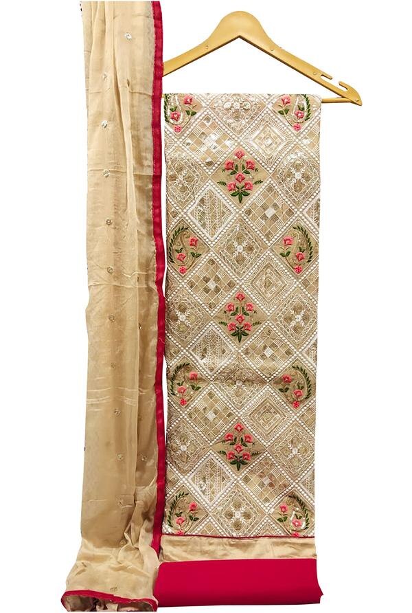 Add a touch of timeless sophistication to your ethnic wardrobe with this graceful Cream Embroidered Floral Chanderi Dress Material with Dupatta. Designed to reflect elegance in every thread, this unstitched set features delicate embroidery on luxurious Chanderi fabric, making it a perfect choice for festive occasions, formal events, and everyday elegance.Top Material: Premium Chanderi fabric in a soft cream hue, adorned with finely detailed floral embroidery that brings out subtle texture and adds a refined, handcrafted look to the ensemble.Bottom Material: Coordinated cotton or Chanderi blend fabric offering comfort and breathability, perfectly complementing the tone and elegance of the embroidered top.Dupatta: Matching Chanderi dupatta, featuring light embroidered accents or printed motifs with a bordered edge, completing the outfit with a graceful, flowing silhouette.Key Features:Fabric: Chanderi (Top & Dupatta), Cotton/Chanderi Blend (Bottom)Work: Floral Thread EmbroideryColor: Cream (soft neutral tone with multi-thread detailing)Type: Unstitched — suitable for custom tailoring in various stylesOccasion: Ideal for festive wear, religious ceremonies, daytime functions, and graceful office wearCare Instructions: Dry clean recommended to preserve embroidery and fabric finishFabric Length:Top: Approx. 2.5 metersBottom: Approx. 2.5 metersDupatta: Approx. 2.25 meters