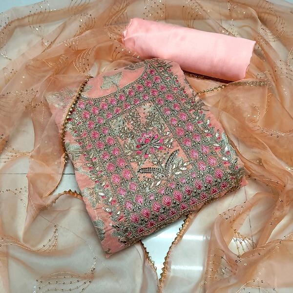 Infuse your ethnic collection with soft charm and intricate artistry through this Peach Embroidered Dress Material paired with a Jacquard Dupatta. Designed for women who love a blend of tradition and style, this unstitched suit fabric features delicate embroidery on a smooth base, complemented by a beautifully woven jacquard dupatta that adds a rich texture and elegance to your ensemble.Top Material: Light and breathable fabric in a gentle peach hue, adorned with fine thread embroidery showcasing floral or ethnic patterns, enhancing the fabric’s grace and appeal.Bottom Material: Coordinated cotton or blended fabric, providing comfort and an ideal match for the embroidered top.Dupatta: Luxurious jacquard dupatta with intricate woven designs or zari work, crafted in complementary tones to perfectly balance the softness of the peach fabric.Key Features:Fabric: Cotton/Poly Blend (Top & Bottom), Jacquard (Dupatta)Work: Fine Embroidery Detailing on TopColor: Soft Peach with Coordinated Jacquard DupattaType: Unstitched — tailor it into your favorite ethnic style (straight suit, Anarkali, churidar)Occasion: Suitable for festive celebrations, casual gatherings, traditional functions, and elegant daywearCare Instructions: Dry clean recommended to preserve embroidery and dupatta textureFabric Length:Top: Approx. 2.5 metersBottom: Approx. 2.5 metersDupatta: Approx. 2.25 meters
