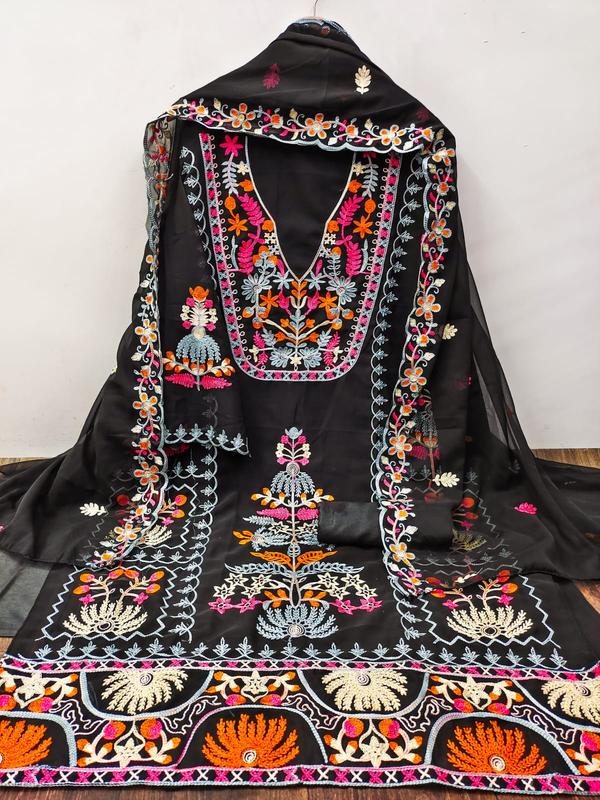 Elevate your ethnic wardrobe with this elegant Black Embroidery Dress Material with Dupatta, a perfect blend of tradition and sophistication. Crafted to perfection, this unstitched ensemble allows for a customized fit and personalized design.Key Features:Top Fabric: Premium cotton/silk/chiffon (adjust based on material) with intricate thread and zari embroideryBottom Fabric: Matching solid fabric for a comfortable and graceful silhouetteDupatta: Complementary embroidered or printed chiffon/net/organza dupatta (based on design)Color: Classic black with contrasting or tonal embroideryWork: Detailed floral or geometric embroidery, enhancing its festive charmStyle Tip: Pair with statement earrings and embellished footwear for a refined ethnic