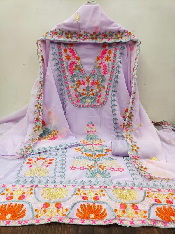 Step into timeless style with this stunning Purple Embroidery Dress Material with Dupatta. The rich purple hue symbolizes grace and royalty, while intricate embroidery adds a touch of ethnic sophistication. This unstitched 3-piece set offers both style flexibility and personalized tailoring.Product Highlights:Top Fabric: Premium cotton / georgette / silk in a luxurious purple tone with delicate thread, zari, or sequin embroideryBottom Fabric: Matching or contrast bottom fabric that complements the topDupatta: Elegant chiffon / net / organza dupatta with embroidered borders or motifsColor: Deep Purple / Lavender / Plum (based on design variation)Work: Intricate embroidery work that blends tradition with modern flairStyle: Unstitched set – easily tailored to your preferred fit and designOccasion: Perfect for festive events, cultural functions, weddings, or elegant day wearWhy You’ll Love It:Royal and versatile purple shade for all skin tonesSophisticated embroidery for an elevated ethnic lookBreathable, quality fabric suitable for long wearIdeal for both everyday elegance and special occasions