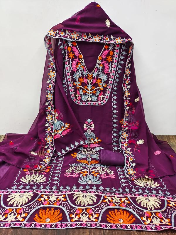 Make a lasting impression with this luxurious Wine Embroidery Dress Material with Dupatta, designed to blend timeless elegance with a modern ethnic vibe. The deep wine hue paired with intricate embroidery adds a touch of royalty and sophistication to your ethnic wardrobe.Product Highlights:Top Fabric: Premium cotton / silk / georgette in a deep wine shade, adorned with delicate thread, zari, or sequin embroideryBottom Fabric: Matching or contrasting fabric for a polished, complete lookDupatta: Elegant chiffon / net / organza dupatta with embroidered detailing or coordinated bordersColor: Rich Wine – bold, elegant, and perfect for festive occasionsWork: Intricate embroidery with floral, paisley, or ethnic motifsStyle: Unstitched 3-piece suit set, customizable to your perfect fitOccasion: Ideal for festive wear, parties, traditional ceremonies, and special eventsWhy You’ll Love It:Deep, luxurious wine color that flatters all skin tonesEmbroidery that adds sophistication without overpowering the lookLightweight yet dressy – perfect for day-to-night occasionsCan be styled as an Anarkali, straight-cut suit, or churidar