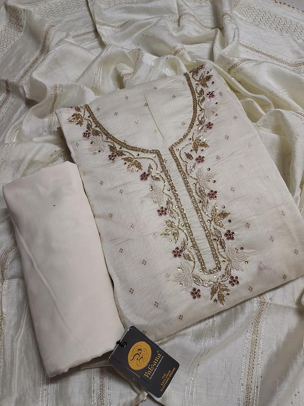 Step into timeless elegance with this New White Color Butti Handwork Dressmaterial, a perfect blend of purity and tradition. Adorned with delicate hand-embroidered butti motifs, this fabric offers a graceful and versatile look that never goes out of style. The pristine white color makes it suitable for all seasons and occasions—from festive gatherings to casual wear.Crafted from soft, breathable fabric, it's ideal for designing stylish tops, kurtis, or ethnic suits. Whether you’re aiming for a minimalist look or layering it with colorful dupattas, this dressmaterial provides the perfect canvas.Highlights:Elegant white color with subtle hand embroideryBeautifully detailed butti work by skilled artisansSoft, breathable, and skin-friendly fabricIdeal for festive, casual, or office wearPerfect for making kurtis, tops, or semi-stitched suits