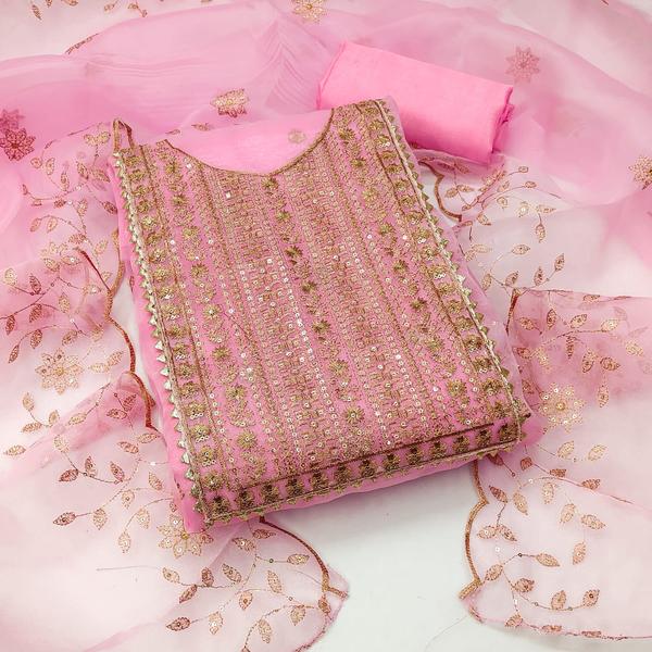 Step into timeless elegance with this Light Pink Embroidery Dress Material with Dupatta, designed to bring out your inner grace and charm. The soothing pastel hue, paired with intricate embroidery, makes this unstitched suit set a perfect pick for festive occasions, casual gatherings, or daytime celebrations.Crafted from high-quality fabric, the set includes an embroidered top, a comfortable bottom material, and a matching dupatta that adds a touch of sophistication. Whether you prefer a straight-cut suit, A-line kurta, or a flowing Anarkali, this versatile fabric set allows for customized tailoring to suit your personal style.📦 Product Details:Top Fabric: [e.g., Chanderi / Cotton / Georgette] with delicate embroideryBottom Fabric: [e.g., Cotton / Santoon / Silk Blend] (Unstitched)Dupatta: Coordinated [e.g., Organza / Net / Chiffon] with embroidery or lace borderColor: Light Pink (Pastel tone)Work: Thread / Zari / Sequin EmbroideryType: Unstitched Dress MaterialOccasion: Festive | Casual | Ethnic Day WearWash Care: Dry clean recommended for first wash💫 Why You'll Love It:Soft pastel color for a graceful ethnic lookElegant embroidery that adds a touch of luxuryComfortable and breathable fabricPerfect for gifting or personal useIdeal for weddings, pujas, or festive functions