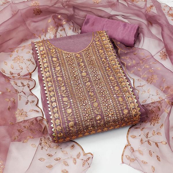 Add a touch of elegance and charm to your ethnic wardrobe with this beautiful Pink Embroidery Dress Material with Dupatta. Featuring delicate embroidery on a soft pink base, this unstitched dress material is perfect for festive occasions, parties, and casual gatherings.The set includes a richly embroidered top fabric, a matching bottom fabric, and a coordinated dupatta, giving you the freedom to tailor a suit that fits your style perfectly. Crafted from premium fabric, it offers both comfort and grace for all-day wear.Whether you’re attending a wedding, festival, or special event, this dress material promises a timeless and graceful look.📦 Product Details:Top Fabric: [e.g., Georgette / Cotton / Chanderi] with embroideryBottom Fabric: [e.g., Santoon / Cotton / Crepe] (Unstitched)Dupatta: Matching [e.g., Net / Organza / Chiffon] with embroidery or lace borderColor: Soft Pink / Pastel PinkWork: Thread / Zari / Sequin EmbroideryType: Unstitched Dress MaterialOccasion: Festive | Casual | Party WearWash Care: Dry clean recommended✨ Highlights:Soft pink shade perfect for a feminine and elegant lookIntricate embroidery adds sophisticationComfortable and breathable fabricVersatile for various occasionsCustomizable tailoring options