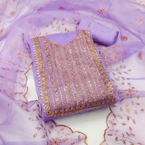 Enhance your ethnic wardrobe with this exquisite Purple Embroidery Dress Material with Dupatta, designed to bring elegance and vibrance to any occasion. The rich purple shade combined with detailed embroidery work creates a stunning and sophisticated look.This unstitched dress material set includes a beautifully embroidered top fabric, a matching bottom, and a coordinating dupatta. Made from high-quality fabric, it offers both comfort and style, perfect for festive events, weddings, or casual celebrations.Tailor this versatile set to your preferred style — be it a straight-cut kurta, Anarkali, or designer suit.📦 Product Details:Top Fabric: [e.g., Georgette / Chanderi / Silk Blend] with embroideryBottom Fabric: [e.g., Cotton / Santoon / Crepe] (Unstitched)Dupatta Fabric: [e.g., Net / Chiffon / Organza] with matching embroidery or borderColor: Deep Purple / LavenderWork: Thread / Zari / Sequin EmbroideryType: Unstitched Dress MaterialOccasion: Festive | Wedding | Party WearWash Care: Dry clean recommended✨ Highlights:Elegant purple color for a regal lookIntricate embroidery detailingSoft, breathable fabric for comfortPerfect for festive and special occasionsCustomizable tailoring options