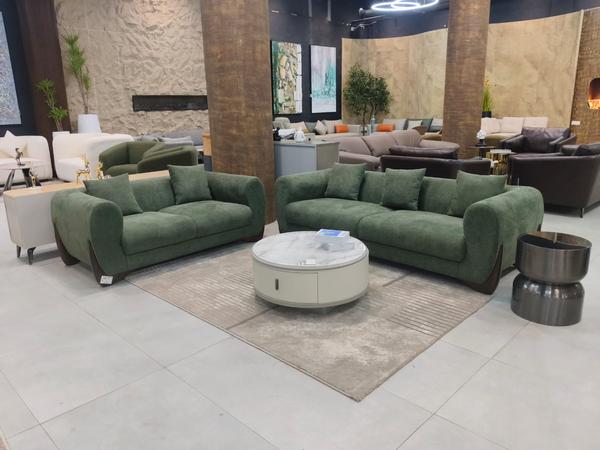 3+2 Seater SofaDiscover luxury and durability with our elegant 3+2 seater sofa set, expertly crafted in-house from premium teak wood. Designed to bring timeless style to your living space, this sofa features plush cushioning made with Sleepwell foam for superior comfort and long-lasting support. Upholstered in high-quality fabric, it combines sophistication with everyday practicality, making it the perfect centerpiece for modern homes. Trust Dicassa Studios for furniture that reflects exceptional craftsmanship and quality you can rely on.